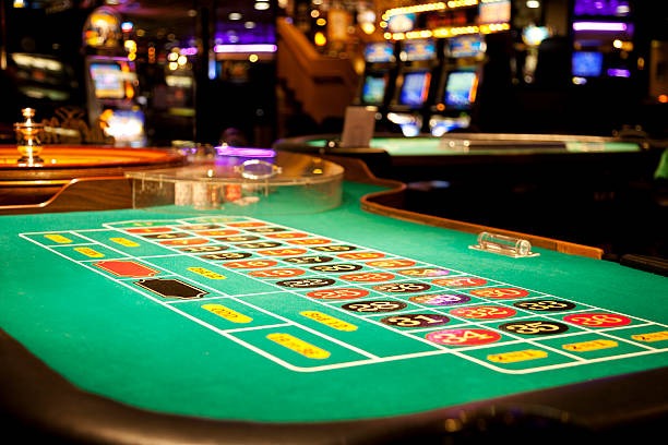 Live-dealer table with multiple camera angles showing blackjack game in progress